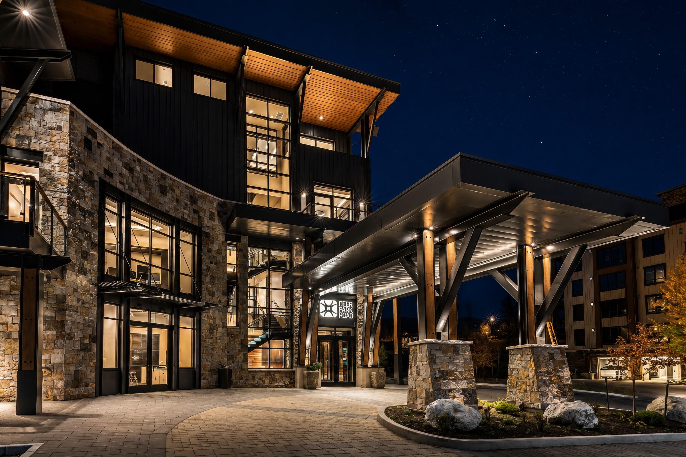 Modern building entrance with porte cochere at night