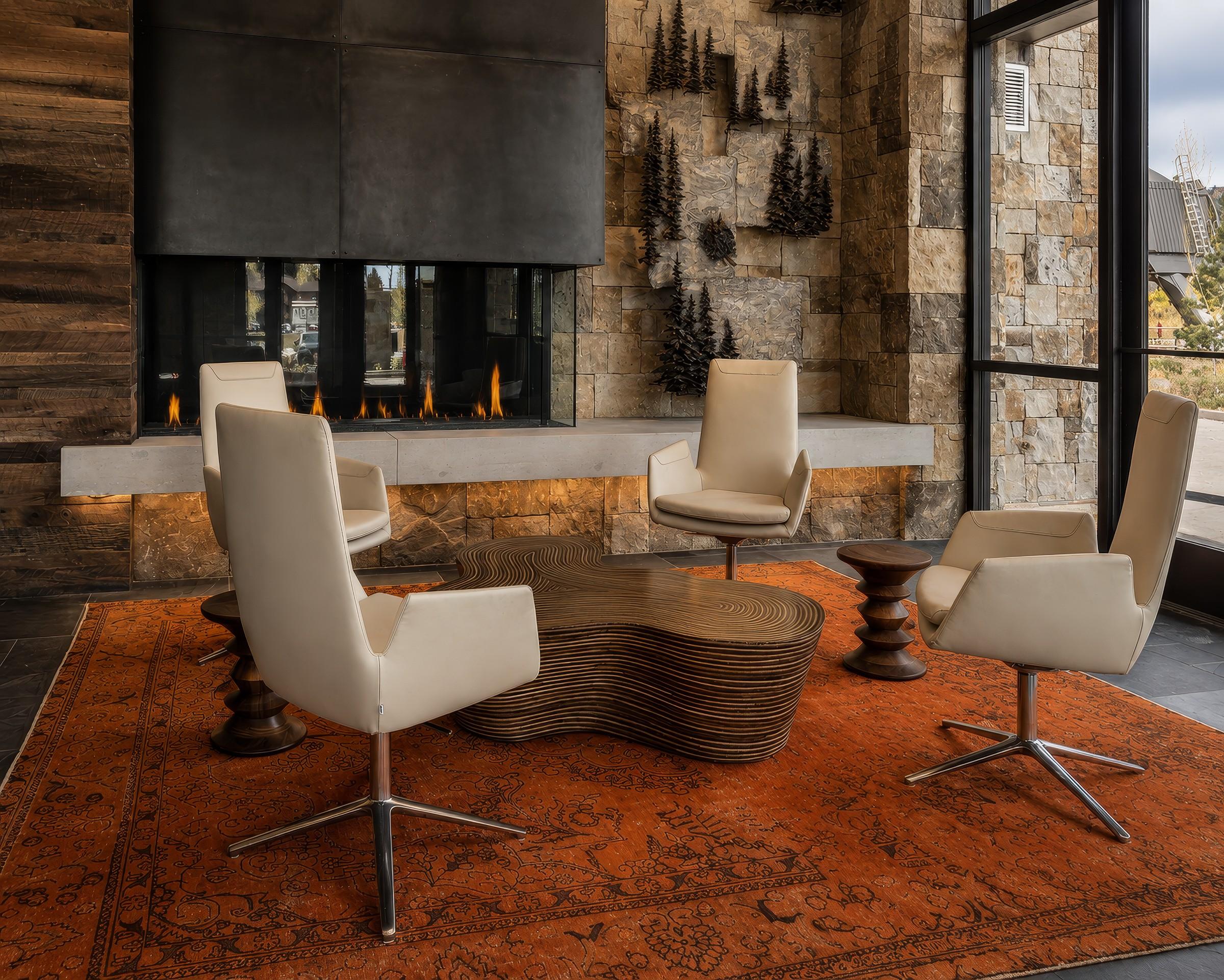 Lobby lounge with fireplace and stone accent wall
