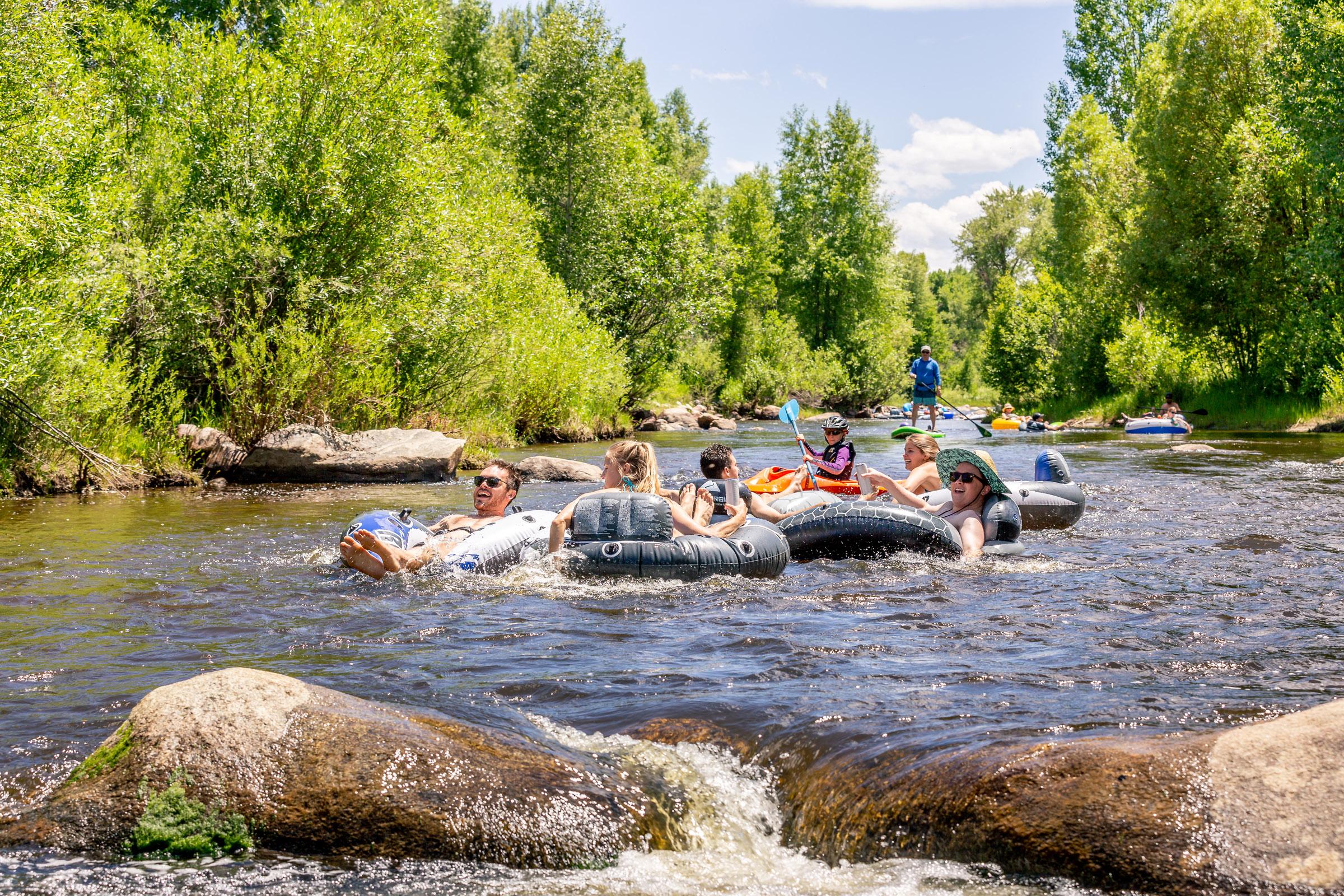 Group river tubing on a summer day